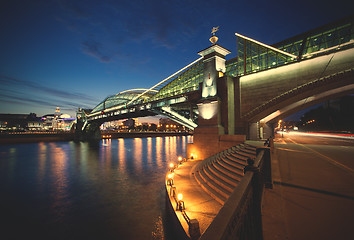 Image showing Night landscape with the illuminated bridge and river. Moscow, R