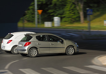 Image showing Two cars in motion