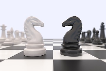 Image showing Two chess pieces on a chessboard