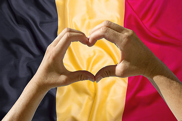 Image showing Hands heart symbol, Belgium flag