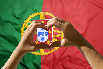 Image showing Hands heart symbol, Portugal flag