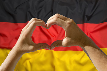 Image showing Hands heart symbol, Germany flag