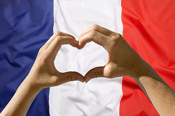 Image showing Hands heart symbol, France flag