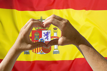 Image showing Hands heart symbol, Spain flag