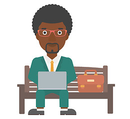 Image showing Man working on laptop.