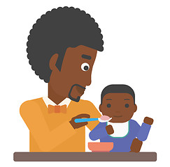 Image showing Man feeding baby.