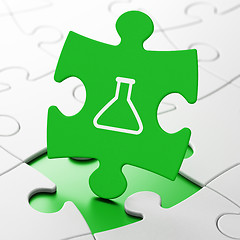 Image showing Science concept: Flask on puzzle background