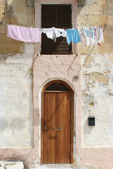 Image showing Washing line in front of a window