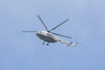 Image showing Anapa, Russia - March 10, 2016: Russian helicopter Mi-8 MTV-1 in flight, in the colors of the Russian Emergencies Ministry