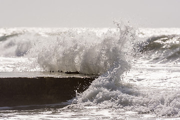 Image showing Waves breaking on the concrete pier