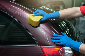 Image showing washing car with sponge