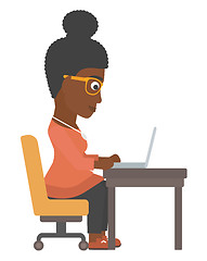 Image showing Woman working at laptop.