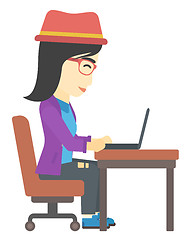 Image showing Woman working at laptop.