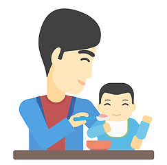 Image showing Man feeding baby.