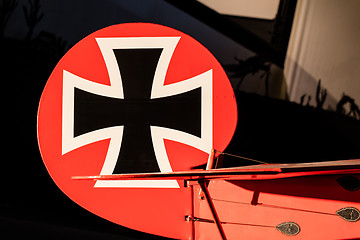 Image showing Close-up of an old german triplane, iron cross painting