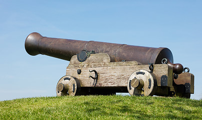 Image showing Old canon on the grass