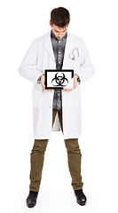 Image showing Doctor holding tablet - Warning! Biohazard!