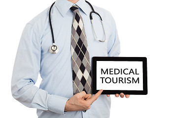 Image showing Doctor holding tablet - Medical tourism