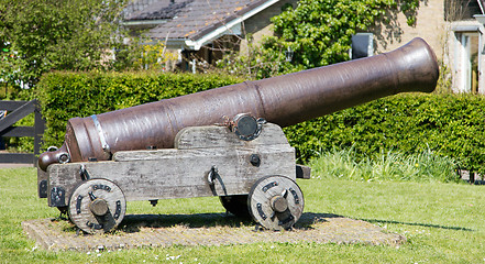 Image showing Old canon on the grass