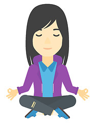 Image showing Business woman meditating in lotus pose.