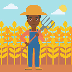 Image showing Farmer with pitchfork.