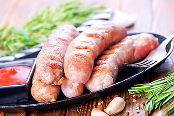 Image showing baked sausages