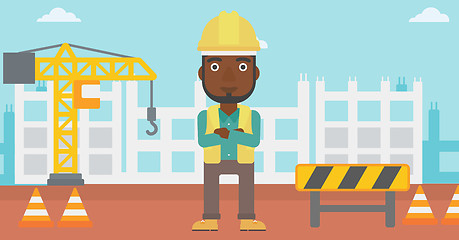 Image showing Friendly builder with arms crossed.