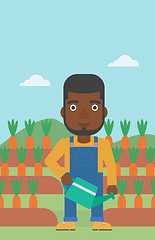 Image showing Farmer with watering can.