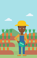 Image showing Farmer with watering can.