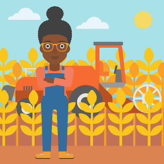 Image showing Woman standing with combine on background.