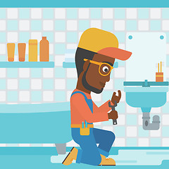 Image showing Man repairing sink.