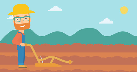 Image showing Farmer on the field with plough.