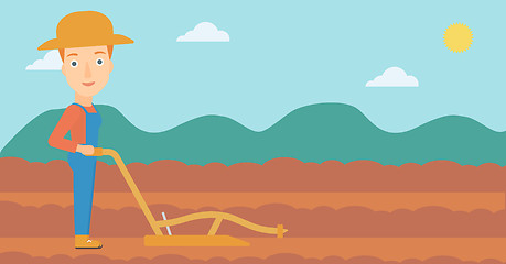 Image showing Farmer on the field with plough.