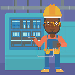 Image showing Electrician with electrical equipment.