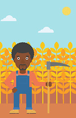 Image showing Farmer on the field with scythe.