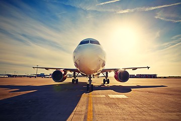 Image showing Airplane at the sunrise