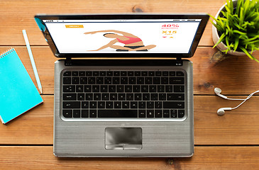 Image showing close up of laptop computer with fitness app