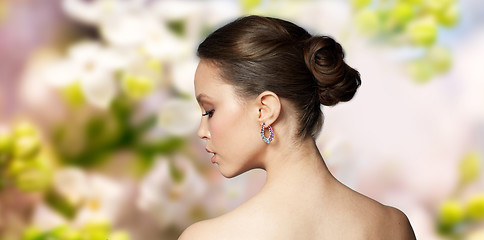 Image showing close up of beautiful woman face with earring