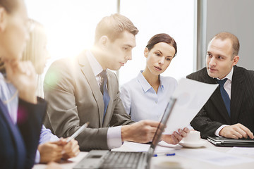 Image showing business team with laptop having discussion