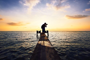 Image showing Photographer at the sunset