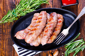 Image showing baked sausages