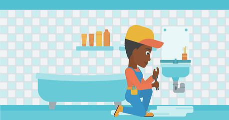 Image showing Woman repairing sink.