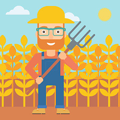 Image showing Farmer with pitchfork.