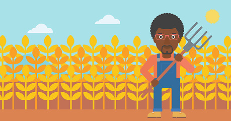 Image showing Farmer with pitchfork.