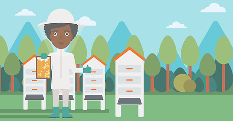 Image showing Bee-keeper at apiary.