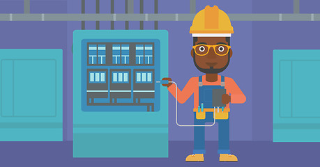 Image showing Electrician with electrical equipment.