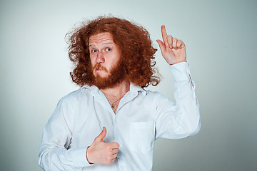 Image showing Portrait of young man with shocked facial expression