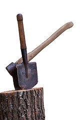 Image showing Stump with axe and shovel