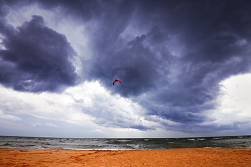 Image showing Power kite in sea and storm sky