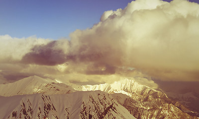 Image showing Snow mountains and blue sky with clouds